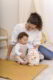 Mama z dzieckiem i szumiącą sową z imieniem